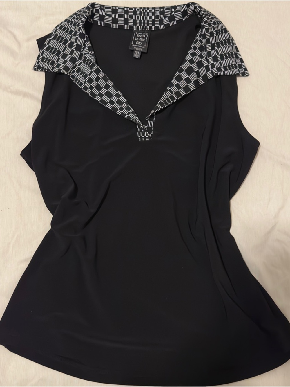 !SOLD!
Suzie In The City Black Sleeveless Top with Geometric Trim